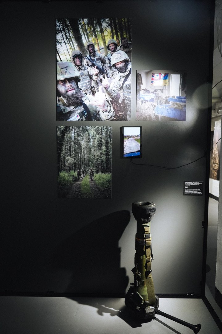 Photographs of Ukrainian and foreign fighters, alongside a disposable NLAW launcher signed by former UK Prime Minister Boris Johnson. (Source: Embassy of Ukraine to the UK) Photographs of Ukrainian and foreign fighters, alongside a disposable NLAW launcher signed by former UK Prime Minister Boris Johnson. (Source: Embassy of Ukraine to the UK)