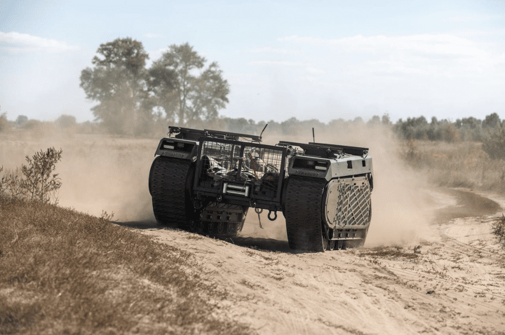 A THeMIS unmanned ground vehicle transports a wounded fighter during field tests in Ukraine conducted by the Hospitallers medical battalion. (Source: Getty Images) A THeMIS unmanned ground vehicle transports a wounded fighter during field tests in Ukraine conducted by the Hospitallers medical battalion. (Source: Getty Images)