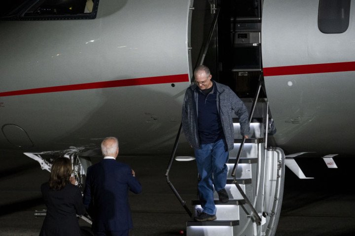 Former US Marine Paul Whelan arrives while greeted by US President Joe Biden and US Vice President Kamala Harris at Joint Base Andrews, Maryland, US, on Thursday, Aug. 1, 2024. (Source: Getty Images) Former US Marine Paul Whelan arrives while greeted by US President Joe Biden and US Vice President Kamala Harris at Joint Base Andrews, Maryland, US, on Thursday, Aug. 1, 2024. (Source: Getty Images)
