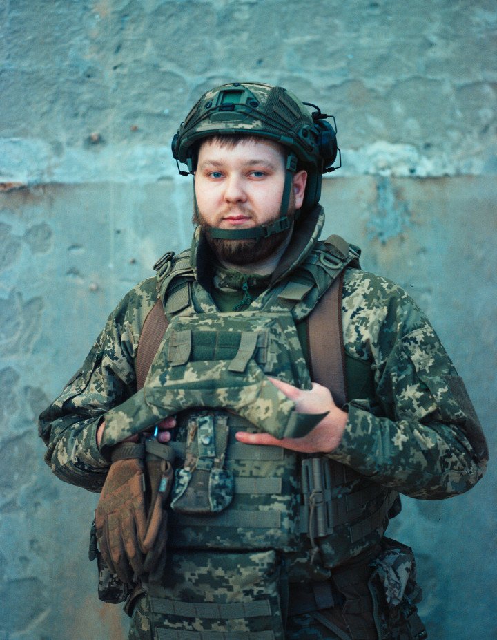 Denys, 23. “Until the day I signed the contract, I was mentally preparing myself all the time... I was going through all sorts of events to improve my knowledge in medicine, shooting, and so on. I came home one day and there was a massive shelling. Shaheds were flying , and then something stooped me. I thought I had to put an end to it, so I joined the army the next day. “ November 2025. Photo by Joshua Olley/UNITED24 Media. Denys, 23. “Until the day I signed the contract, I was mentally preparing myself all the time... I was going through all sorts of events to improve my knowledge in medicine, shooting, and so on. I came home one day and there was a massive shelling. Shaheds were flying , and then something stooped me. I thought I had to put an end to it, so I joined the army the next day. “ November 2025. Photo by Joshua Olley/UNITED24 Media.