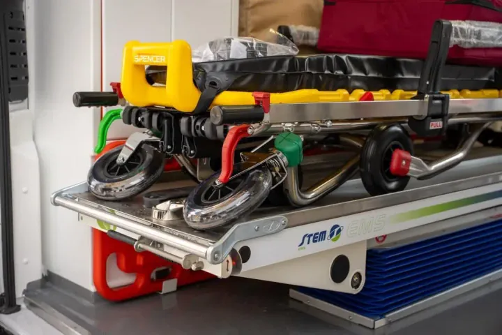 The vehicle displays the Kazakhstan-Ukraine humanitarian aid logo: “A gift to Ukrainians from BI Group.” (Source: MOH)