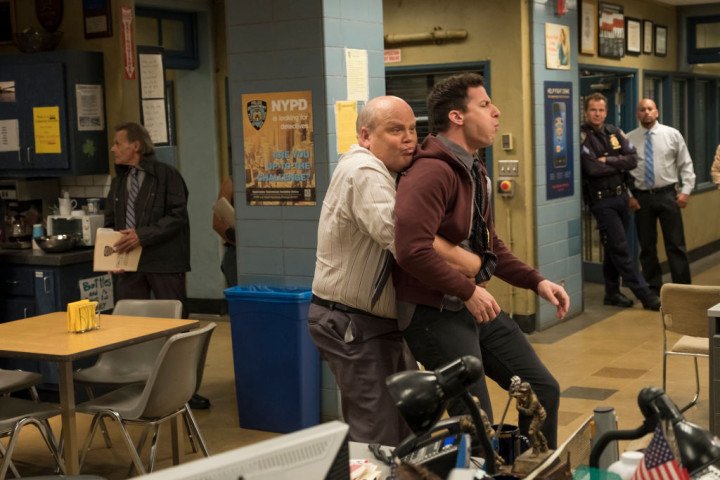"The Venue" Episode 506 — Pictured: (l-r) Dirk Blocker as Michael Hitchcock, Andy Samberg as Jake Peralta. Photo by: John P. Fleenor/Fox/Universal Television/NBCU Photo Bank/NBCUniversal via Getty Images "The Venue" Episode 506 — Pictured: (l-r) Dirk Blocker as Michael Hitchcock, Andy Samberg as Jake Peralta. Photo by: John P. Fleenor/Fox/Universal Television/NBCU Photo Bank/NBCUniversal via Getty Images