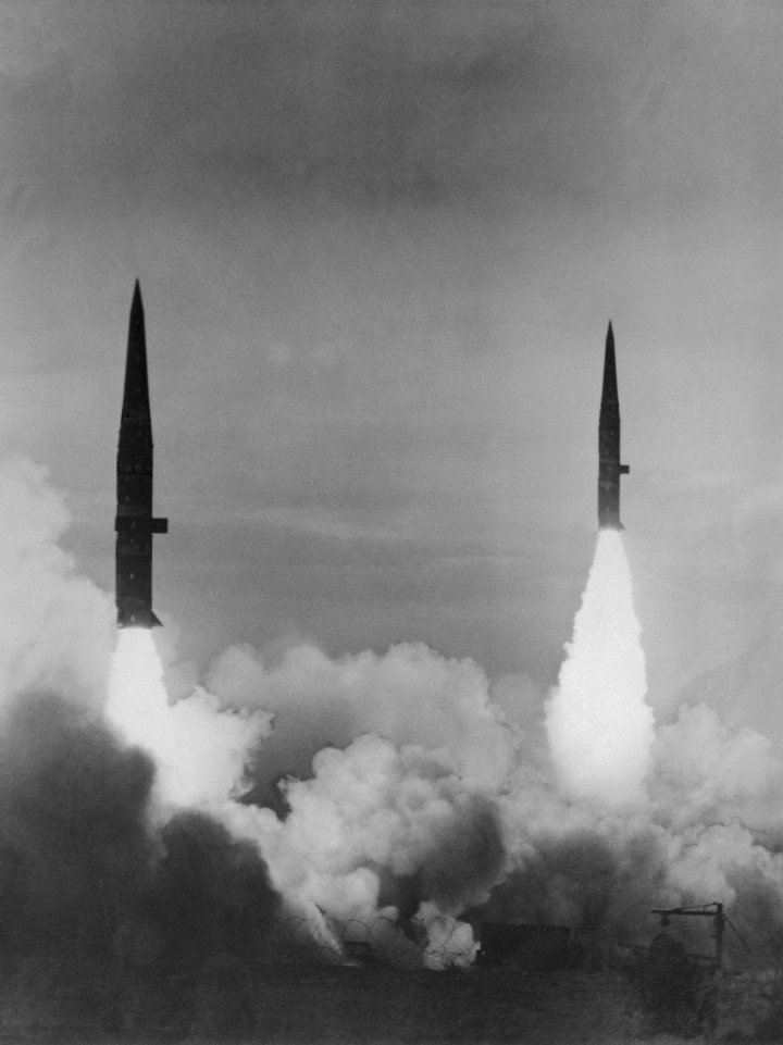 Two US Army Pershing missiles, 100 yards apart, roar skyward during a simultaneous launch from the Black Mesa firing point on March 28, 1967. (Source: Getty Images) Two US Army Pershing missiles, 100 yards apart, roar skyward during a simultaneous launch from the Black Mesa firing point on March 28, 1967. (Source: Getty Images)
