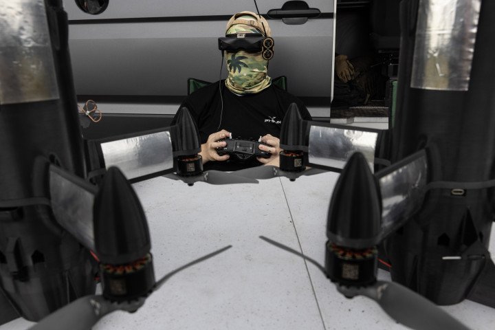 A drone pilot sets up the P1-SUN Long Interceptor Drone during a live demonstration in Central Ukraine on July 7, 2026. Powered by an AI module that autonomously detects and tracks targets, the system extends strike capabilities up to 33 kilometers to hunt Shahed-type UAVs. (Photo by Paula Bronstein/Getty Images) A drone pilot sets up the P1-SUN Long Interceptor Drone during a live demonstration in Central Ukraine on July 7, 2026. Powered by an AI module that autonomously detects and tracks targets, the system extends strike capabilities up to 33 kilometers to hunt Shahed-type UAVs. (Photo by Paula Bronstein/Getty Images)