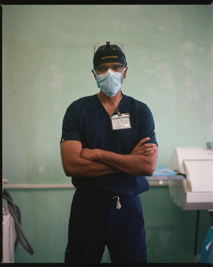 Dr. Manoj Abraham, senior advisor to the “Face to Face” mission, brings decades of experience in facial plastic surgery. Photo: Josh Olley Dr. Manoj Abraham, senior advisor to the “Face to Face” mission, brings decades of experience in facial plastic surgery. Photo: Josh Olley