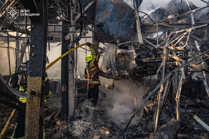 Firefighters work among the rubble and burning debris after a Russian drone strike hit an industrial site in Sumy, leaving buildings destroyed and vehicles damaged, on September 12, 2025. (Source: DSNS) Firefighters work among the rubble and burning debris after a Russian drone strike hit an industrial site in Sumy, leaving buildings destroyed and vehicles damaged, on September 12, 2025. (Source: DSNS)
