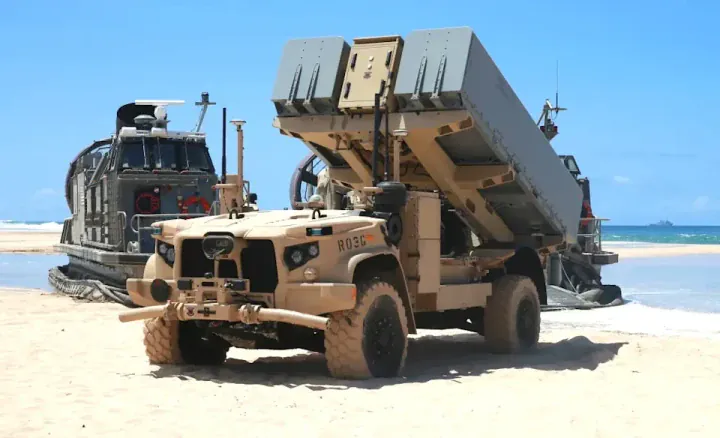 A U.S. Marine Corps NMESIS coastal defense system with Naval Strike Missiles deployed on a JLTV platform during amphibious landing drills. (Source: Defense Express)