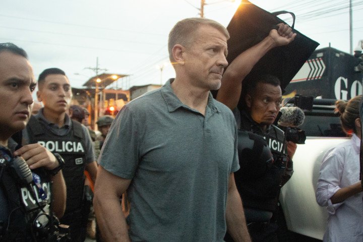 Erik Prince walks with Ecuadorian police during the 'Apolo 13' anti-crime operation in Guayaquil, April 5, 2025. (Source: Getty Images) Erik Prince walks with Ecuadorian police during the 'Apolo 13' anti-crime operation in Guayaquil, April 5, 2025. (Source: Getty Images)