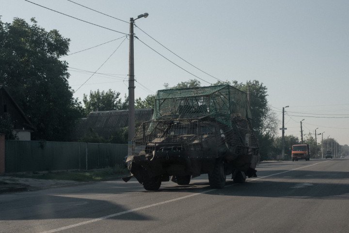 Ukrainian Roshel Senator APC equipped with drone protection moves near the frontline city of Druzhkivka in Donetsk region. (Source: Getty Images)