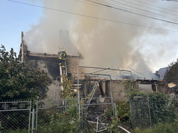 Firefighters extinguish a burning house in Lutsk after a Russian missile and drone strike on July 12. (Source: SES of Volyn Region) Firefighters extinguish a burning house in Lutsk after a Russian missile and drone strike on July 12. (Source: SES of Volyn Region)