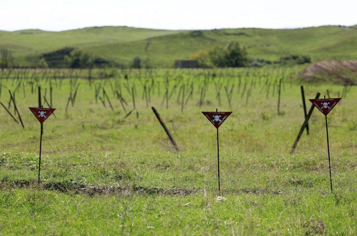 October 5, 2023: Signs warning for land mines in the former vineyards around Fuzuli, in Azerbaijan's controlled region of Nagorno-Karabakh. (Photo by EMMANUEL DUNAND/AFP via Getty Images)