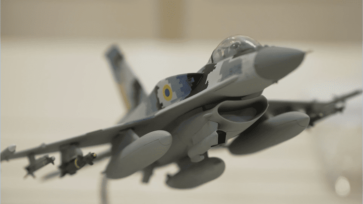 Close-up of an F-16 fighter jet model featuring Ukrainian Air Force markings and digital camouflage. (Source: Ukrainian President’s Office) Close-up of an F-16 fighter jet model featuring Ukrainian Air Force markings and digital camouflage. (Source: Ukrainian President’s Office)