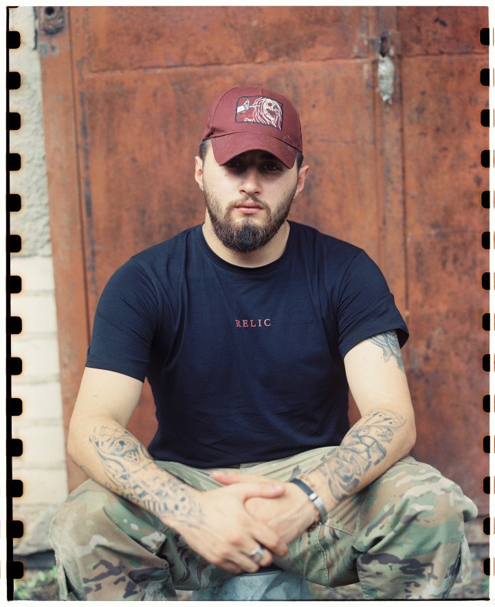 Xerox, one of the twin brothers fighting with the Kara-Dag brigade on Ukraine’s north-eastern front. Ukraine, August 2025. Photo by Lucile Brizard/UNITED24 Media.