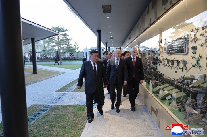Kim Jong Un and Russian officials inspect a display of drones and electronic equipment inside a museum showcasing claimed captured Ukrainian weapons, Pyongyang, April 2026. (Source: KCNA)