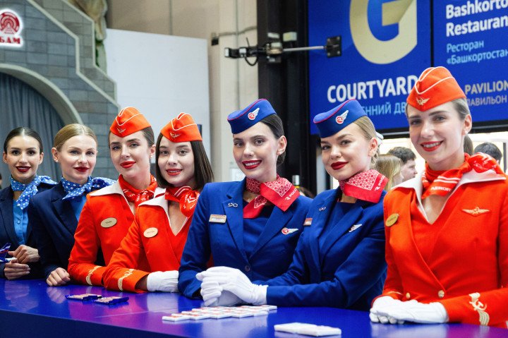 Flight attendants of Aeroflot airline at the stand on the second day of the St. Petersburg International Economic Forum, which featured numerous sessions, plenary meetings, and business agreements, on June 6, 2024. (Source: Getty Images). Flight attendants of Aeroflot airline at the stand on the second day of the St. Petersburg International Economic Forum, which featured numerous sessions, plenary meetings, and business agreements, on June 6, 2024. (Source: Getty Images).