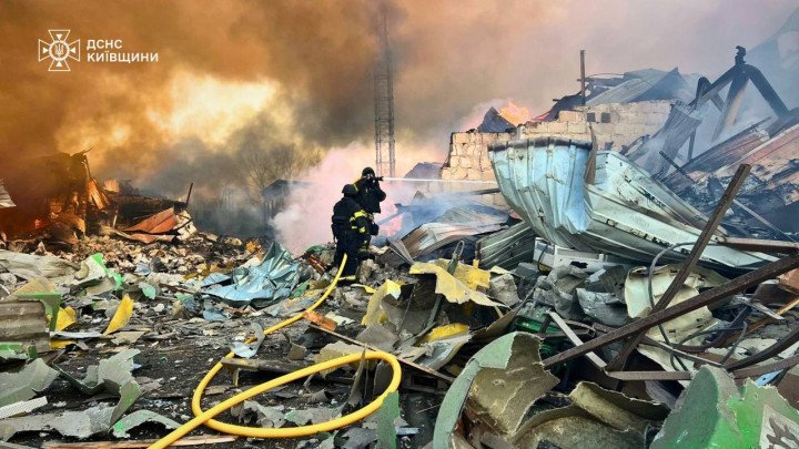 Ukrainian firefighters work among destroyed buildings after Russian missile and drone strikes caused major damage in the Kyiv region on March 14, 2026. (Source: State Emergency Service of Ukraine in the Kyiv region)