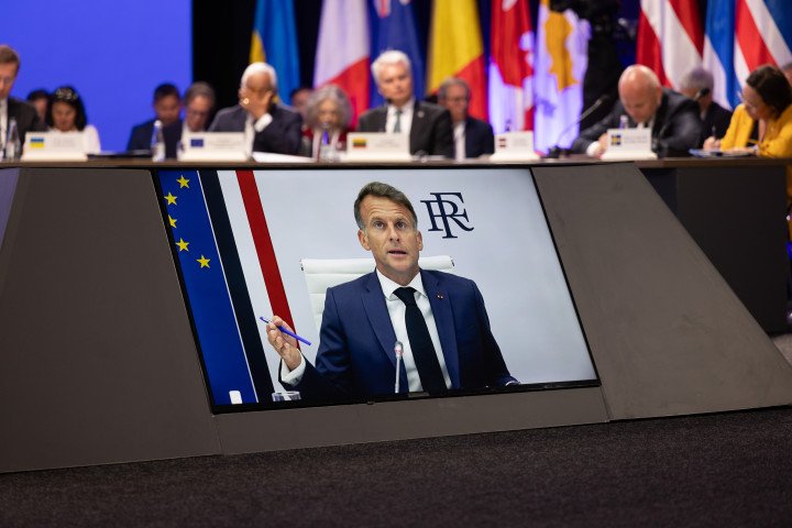 French President Emmanuel Macron addresses the Coalition of the Willing meeting via video link. Photo: Vic Bakin/UNITED24 Media French President Emmanuel Macron addresses the Coalition of the Willing meeting via video link. Photo: Vic Bakin/UNITED24 Media