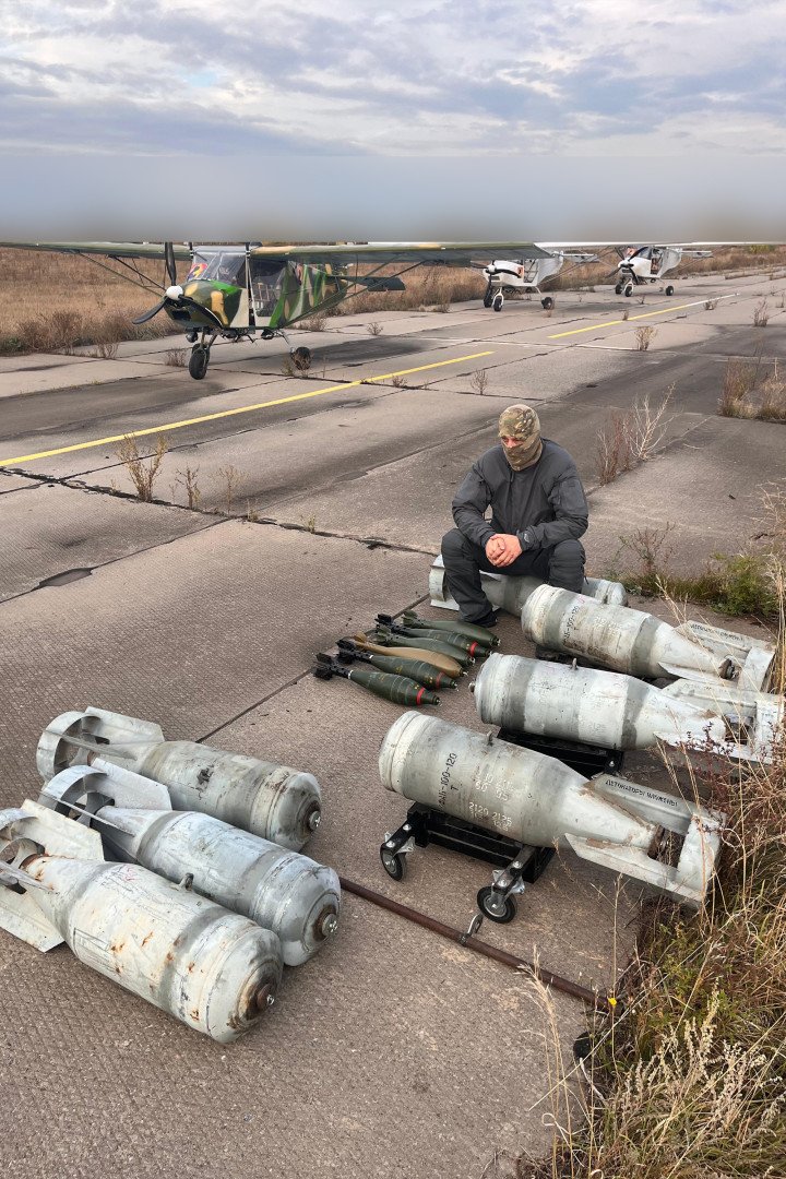 “Horynych” sitting near OFAB-100-120 air bombs and 120mm mortar munitions. E300 drones are seen in the background. (Source: Babel)
