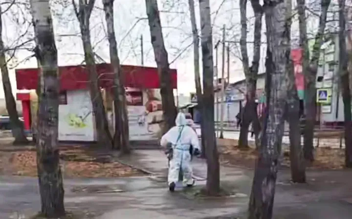 A worker in full protective gear in Shelekhov, Russia’s Irkutsk region. (Source: The Sun/East2West) A worker in full protective gear in Shelekhov, Russia’s Irkutsk region. (Source: The Sun/East2West)
