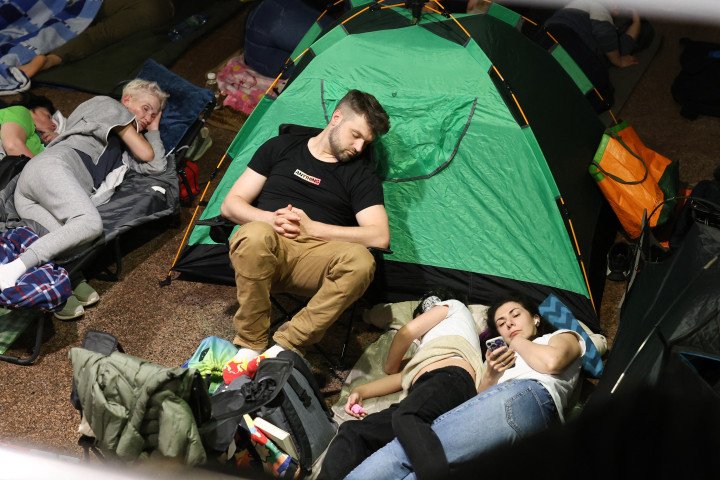 People shelter in a Kyiv metro station during a Russian missile and drone attack on the Ukrainian capital on June 15, 2026. (Source: Getty Images)