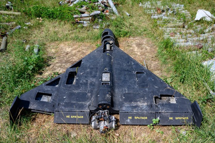 Remains of a Russian-made Geran-2 loitering munition—Russia’s designation for the Iranian-designed Shahed-136—displayed among other weapons used in attacks on Ukraine, in Kharkiv on July 30, 2025. The same type of drone was reportedly involved in the attack on Dubai. (Source: Getty Images)