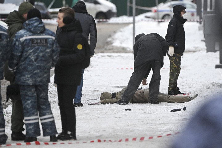 Investigators work by a body at the blast scene which killed commander Igor Kirillov, and his assistant (Source: Alexander Nemenov via Getty Images) Investigators work by a body at the blast scene which killed commander Igor Kirillov, and his assistant (Source: Alexander Nemenov via Getty Images)
