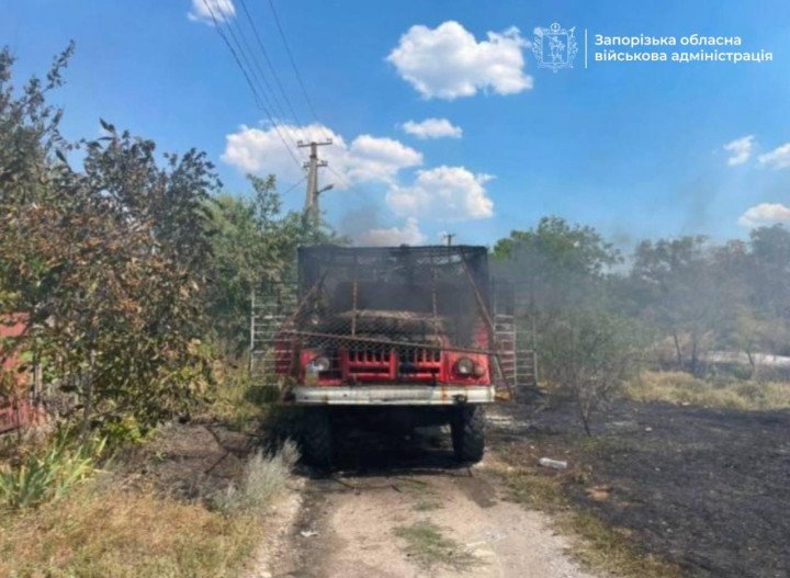 A damaged fire engine stands at the scene after a Russian repeat strike in the Zaporizhzhia district on August 7. Two rescuers were injured when Russian forces attacked emergency crews responding to an earlier strike. (Source: Zaporizhzhia Regional Military Administration)