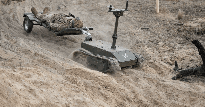 A ground robotic system pulls a stretcher during a simulated evacuation of a wounded soldier. (Photo: open source) A ground robotic system pulls a stretcher during a simulated evacuation of a wounded soldier. (Photo: open source)
