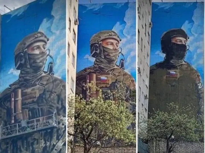 Progression of the mural in Dzerzhinsky, Russia, initially showing a Ukrainian Azov soldier. Later edits added Russian symbols before the image was painted over entirely. (Source: Russian media) Progression of the mural in Dzerzhinsky, Russia, initially showing a Ukrainian Azov soldier. Later edits added Russian symbols before the image was painted over entirely. (Source: Russian media)