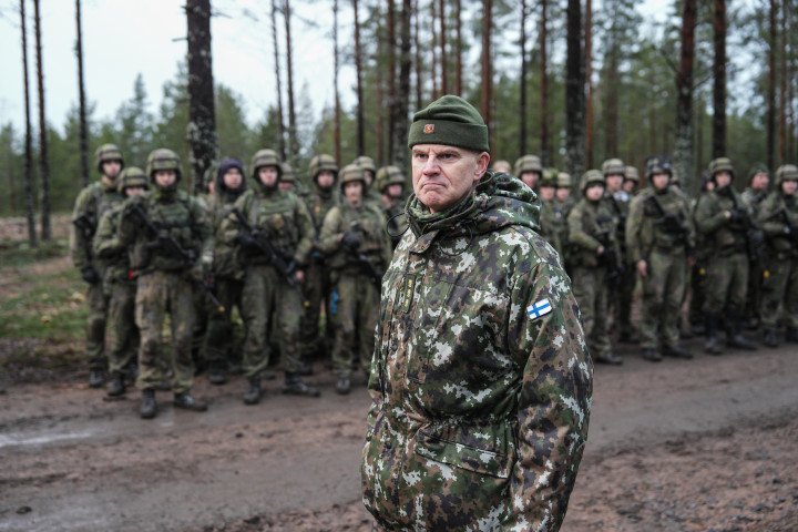 Pasi Valimaki, lieutenant general and commander of the Finnish Army, in front of the troops of the Pori Brigade after an exercise in occasion of a demonstration of First-Person View (FPV) drone training and anti-drone capabilities by the Finnish Army's Pori Brigade in Niinisalo, Finland, on Tuesday, Dec. 9, 2025. Finland's government plans to raise the country's defense spending to 3% of economic output by 2029 to address the risks from a more aggressive Russia, Prime Minister Petteri Orpo said. Photographer: Alessandro Rampazzo/Bloomberg via Getty Images Pasi Valimaki, lieutenant general and commander of the Finnish Army, in front of the troops of the Pori Brigade after an exercise in occasion of a demonstration of First-Person View (FPV) drone training and anti-drone capabilities by the Finnish Army's Pori Brigade in Niinisalo, Finland, on Tuesday, Dec. 9, 2025. Finland's government plans to raise the country's defense spending to 3% of economic output by 2029 to address the risks from a more aggressive Russia, Prime Minister Petteri Orpo said. Photographer: Alessandro Rampazzo/Bloomberg via Getty Images