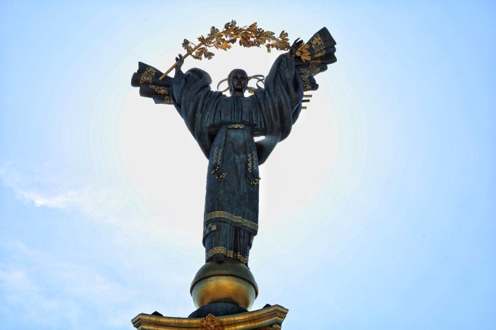 A figurine of a woman (Berehynia) with guelder-rose branch in her hand on top of the Independence Monument is seen in front of the sky on Maidan Nezalezhnosti on the 33rd anniversary of the independence of Ukraine on August 24, 2024 in Kyiv, Ukraine. (Photo by Yan Dobronosov/Global Images Ukraine via Getty Images)