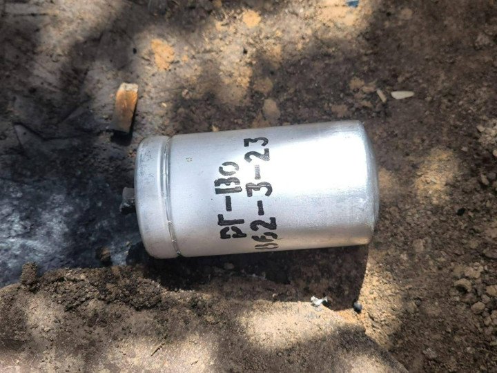 A gas grenade marked “RG-VO” lies partially embedded in the soil, evidence of the continued use of chemical agents on the battlefield. (Source: Public Affairs Officer of the Command of the Support Forces Lt. Col. Maksym Kravchuk) A gas grenade marked “RG-VO” lies partially embedded in the soil, evidence of the continued use of chemical agents on the battlefield. (Source: Public Affairs Officer of the Command of the Support Forces Lt. Col. Maksym Kravchuk)