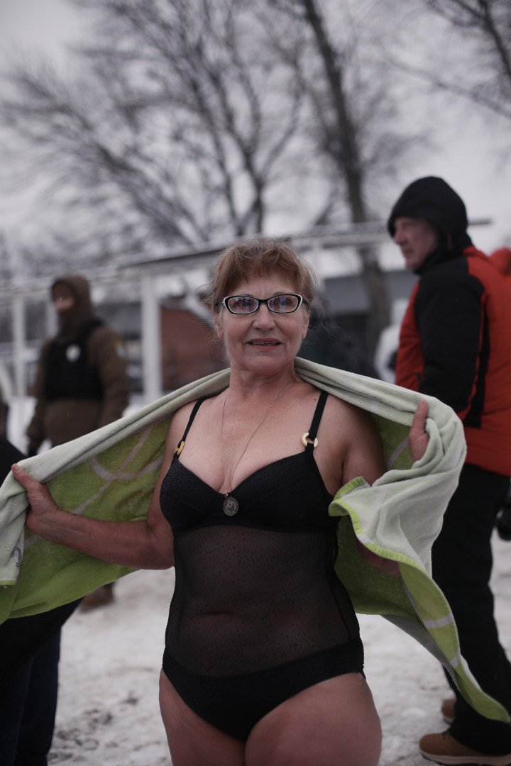 A woman dries off after her Epiphany plunge at Kyiv’s Hydropark. Kyiv, Ukraine, January 6, 2026. (Photo: Lucile Brizard) A woman dries off after her Epiphany plunge at Kyiv’s Hydropark. Kyiv, Ukraine, January 6, 2026. (Photo: Lucile Brizard)