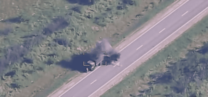 A Ukrainian intelligence drone captures a strike on a Russian military vehicle traveling along a road in occupied southern Ukraine. Kyiv has reported intensifying attacks on Russian logistics supporting the land corridor to temporarily occupied Crimea. (Source: HUR).