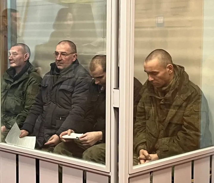 Four servicemen of the 16th separate special forces brigade of the Main Directorate of the General Staff of the Russian Armed Forces. They were captured during the liberaion of the Kharkiv region and are facing trial in a Ukrainian court in Poltava. (Photo: Iryna Saliy, “Court Reporter”) Four servicemen of the 16th separate special forces brigade of the Main Directorate of the General Staff of the Russian Armed Forces. They were captured during the liberaion of the Kharkiv region and are facing trial in a Ukrainian court in Poltava. (Photo: Iryna Saliy, “Court Reporter”)