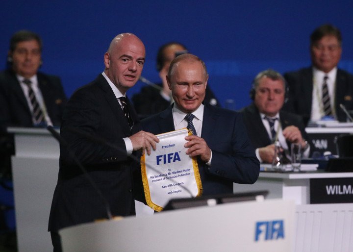 Russian leader Vladimir Putin listens to FIFA President Gianni Infantino during the 68th FIFA Congress at the Moscow Expocentre on June 13, 2018, in Moscow, Russia. (Source: Getty Images) Russian leader Vladimir Putin listens to FIFA President Gianni Infantino during the 68th FIFA Congress at the Moscow Expocentre on June 13, 2018, in Moscow, Russia. (Source: Getty Images)