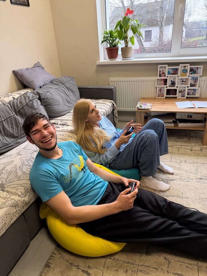 Iryna Tuliakova with Mykyta, who now lives in a supported living home after spending years in institutional care. (Source: Personal archive of Iryna Tuliakova)
