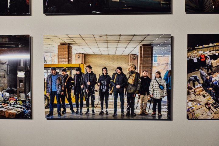 A photograph by Laurent Van der Stockt, depicting your volunters of the territorial defense at the beginning of the Russian full-scale invasion in the Kyiv region. The photo was part of the Van der Stockt solo exhibition at the IMPACT KYIV forum.. Kyiv, Ukraine, October 2026 (photo: Louis Beaudemont)