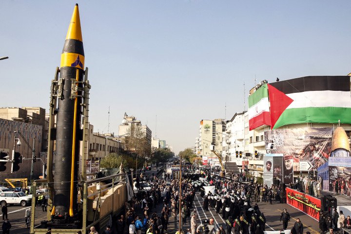 Iran's fourth-generation Khorramshahr (Khaibar) ballistic missile displayed during a pro-Palestinian rally in Tehran, November 2023. (Source: Getty Images)