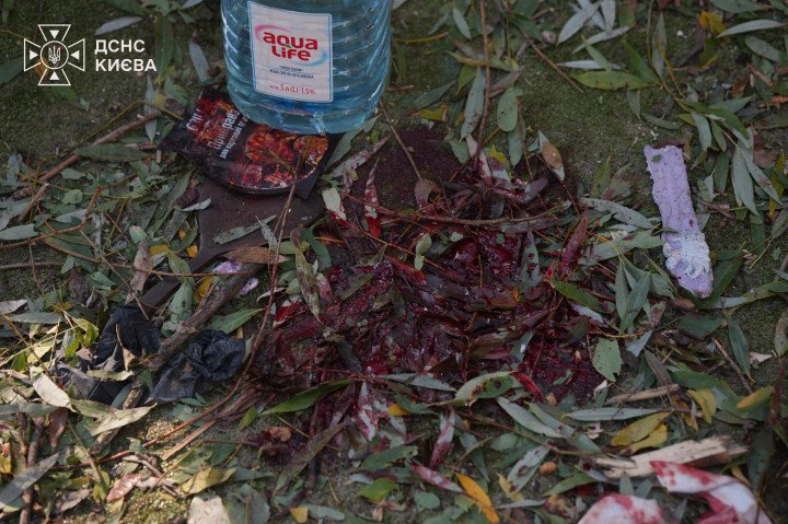 Bloodstained ground and scattered debris at the site of a Russian missile attack in Kyiv on October 10, 2026. (Source: State Emergency Service of Ukraine)