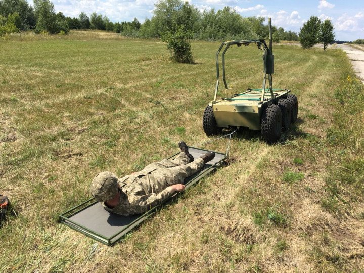 A Ukrainian “Ravlyk” unmanned ground vehicle demonstrates casualty evacuation capability during field testing. (Photo: Brave Inventors) A Ukrainian “Ravlyk” unmanned ground vehicle demonstrates casualty evacuation capability during field testing. (Photo: Brave Inventors)