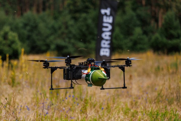 A quadrocopter drone carrying a large ordinance during testing (Photo: UNITED24 Media)