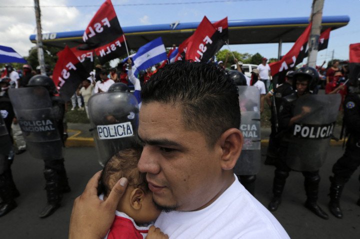 Riot police prevent Ortega supporters from clashing with demonstrators against Nicaraguan President Daniel Ortega's government, during a march in Managua, on September 9, 2018. (Source: Inti Ocon via Getty Images) Riot police prevent Ortega supporters from clashing with demonstrators against Nicaraguan President Daniel Ortega's government, during a march in Managua, on September 9, 2018. (Source: Inti Ocon via Getty Images)