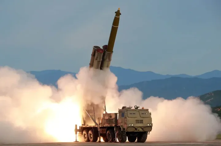A KN-25 multiple launch rocket system fires a large-caliber guided rocket during a test in 2019, showcasing North Korea’s evolving artillery capabilities. (Source: Defense Express) A KN-25 multiple launch rocket system fires a large-caliber guided rocket during a test in 2019, showcasing North Korea’s evolving artillery capabilities. (Source: Defense Express)