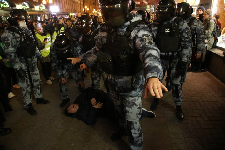 Russian Police officers, one "Z" on his uniform, a symbol of support of the military invasion in Ukraine, detains an anti-war protester September, 2022, Moscow. (Source: Contributor via Getty Images) Russian Police officers, one "Z" on his uniform, a symbol of support of the military invasion in Ukraine, detains an anti-war protester September, 2022, Moscow. (Source: Contributor via Getty Images)
