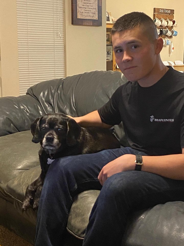 Ethan Hertweck with family dog. Photo: Leslie Hertweck’s Facebook Ethan Hertweck with family dog. Photo: Leslie Hertweck’s Facebook