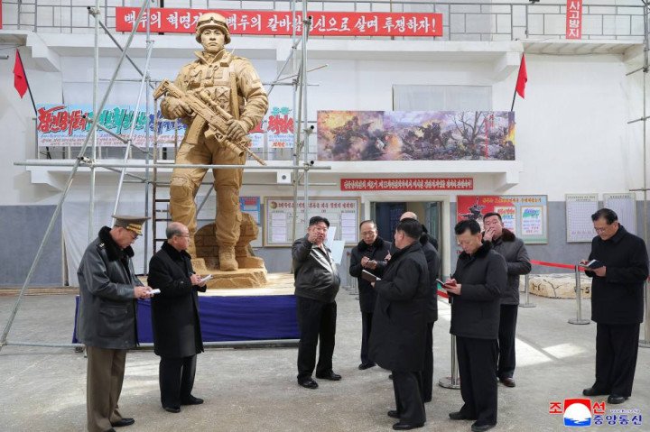 Kim Jong Un oversees a statue of a fully armed soldier, part of a monument honoring North Korean troops killed abroad. (Photo: KCNA)