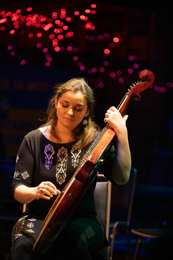 The February 24, 2025 “Diary of War” theater reading opened with an instrumental set by singer and bandurist Teryn Kuzma. Photo: Anastasiia Krasheninnikova The February 24, 2025 “Diary of War” theater reading opened with an instrumental set by singer and bandurist Teryn Kuzma. Photo: Anastasiia Krasheninnikova
