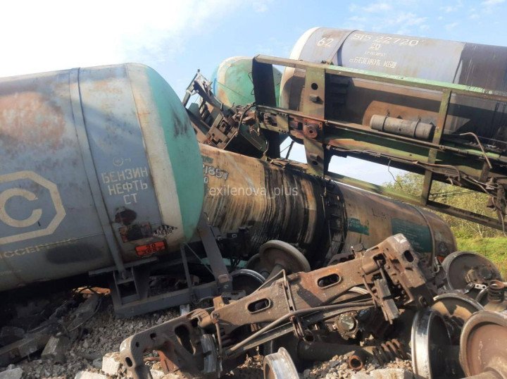 Close-up of overturned and damaged fuel tank cars after the derailment in Luga district, showing visible burns and structural destruction. (Source: Russian media) Close-up of overturned and damaged fuel tank cars after the derailment in Luga district, showing visible burns and structural destruction. (Source: Russian media)