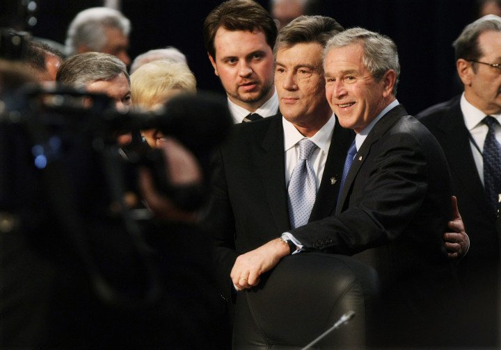 Ukraine's president Viktor Yushchenko, and US President George W. Bush, pose for a photo during the NATO summit in Bucharest, Romania, April 3, 2008. NATO rebuffed bids by Ukraine and Georgia to be put on a fast track toward membership. (Photo: Suzanne Plunkett via Getty Images)